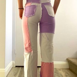 Pink, purple, and white patchy jeans